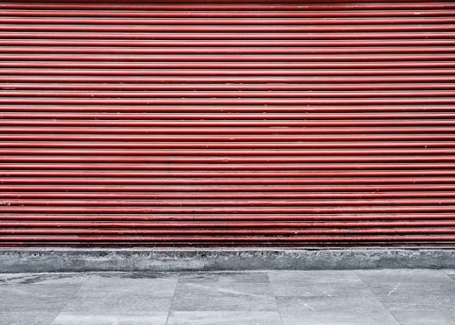 Motorised security roller shutter