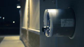 Close-up of a sleek energy meter installed on a clean white wall