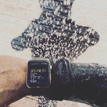 Close-up of swimmer's arm with biomechanical motion tracking graphics