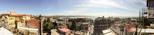 A panoramic view of a commercial property in a busy Sudanese neighborhood