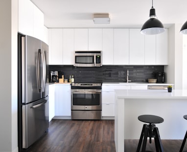 gray steel 3-door refrigerator near modular kitchen