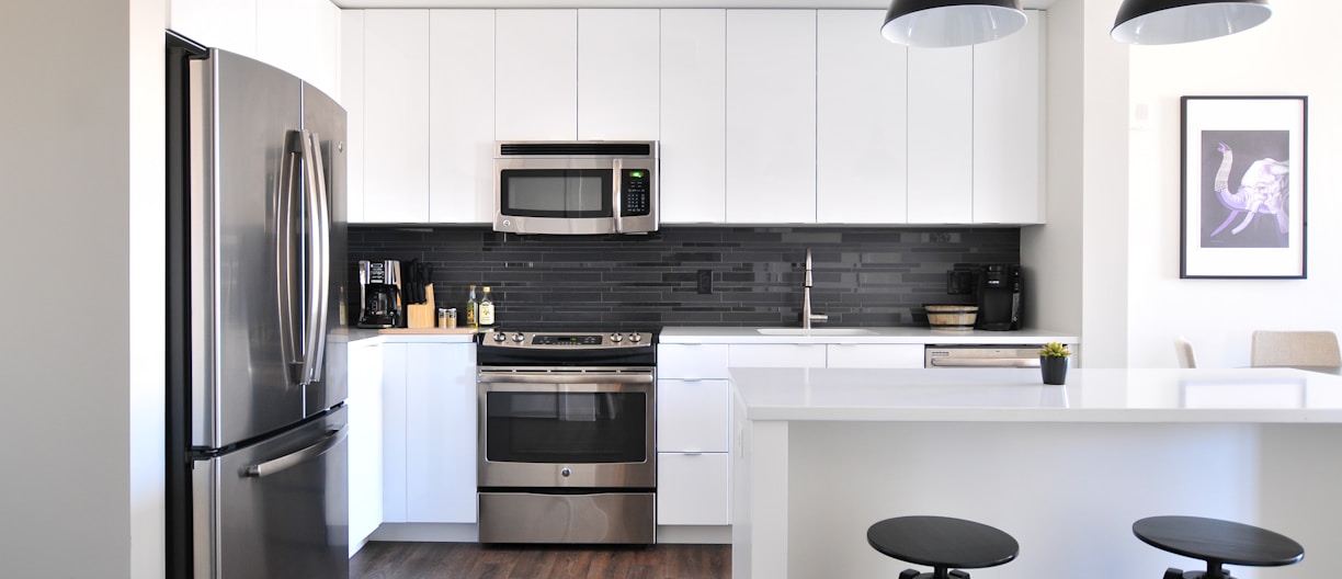 gray steel 3-door refrigerator near modular kitchen