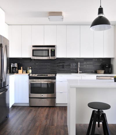 gray steel 3-door refrigerator near modular kitchen