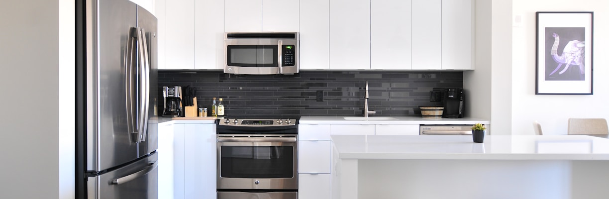 gray steel 3-door refrigerator near modular kitchen