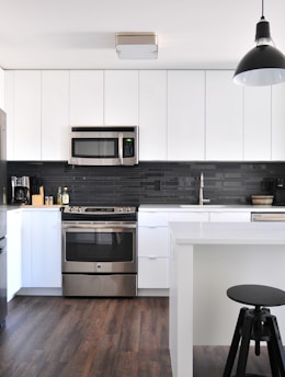 gray steel 3-door refrigerator near modular kitchen