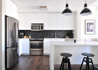 gray steel 3-door refrigerator near modular kitchen