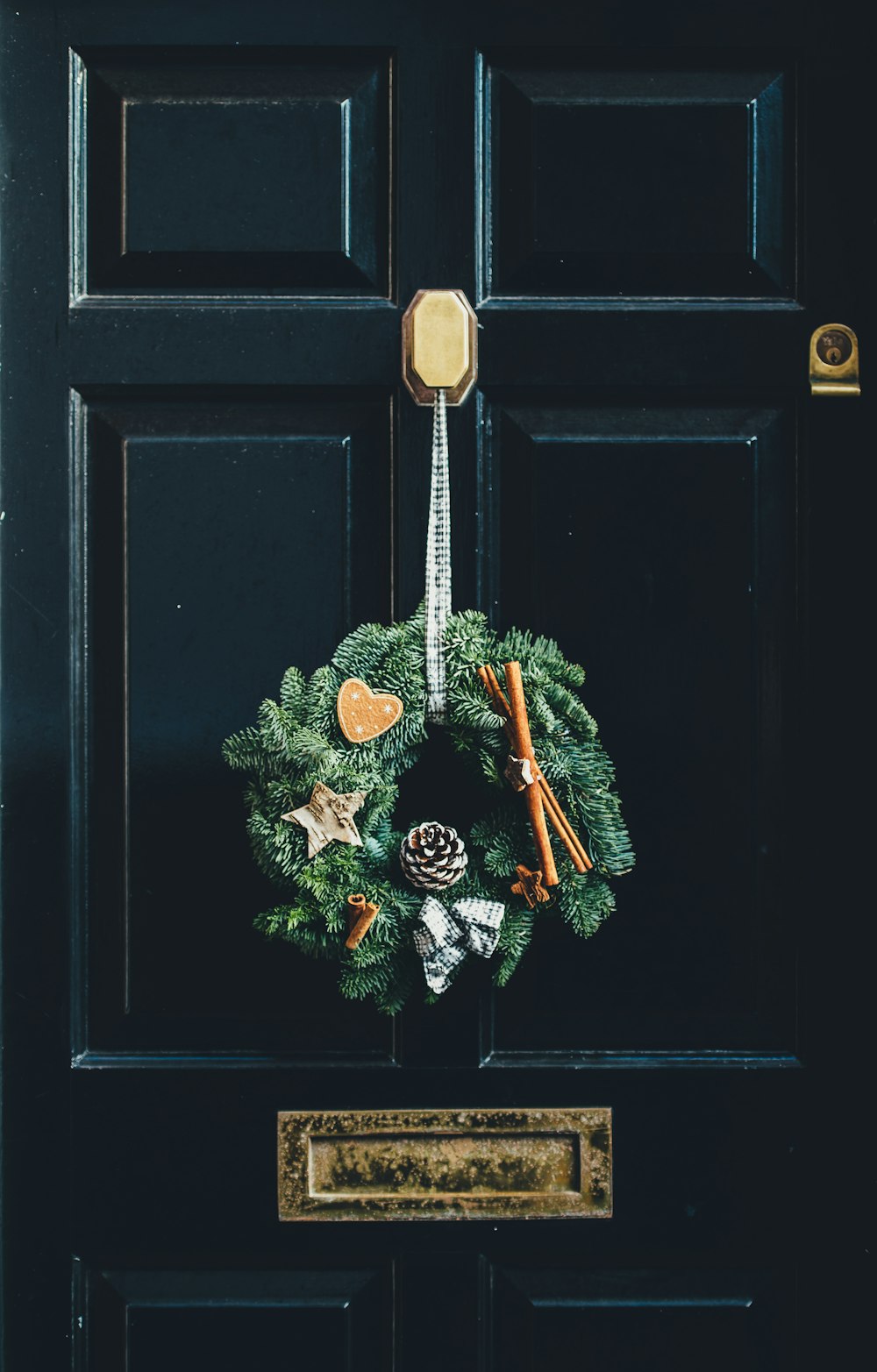 green wreath hang on door