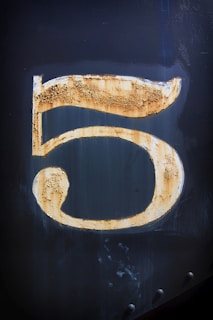 number 5 wood artwork