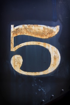 number 5 wood artwork