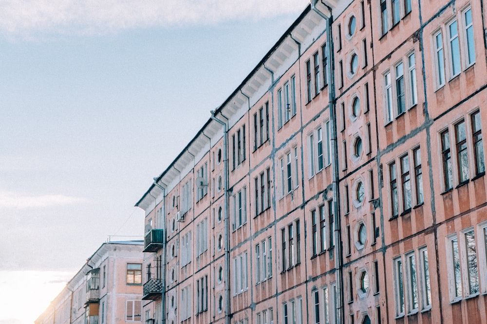 brown and gray concrete building at daytime