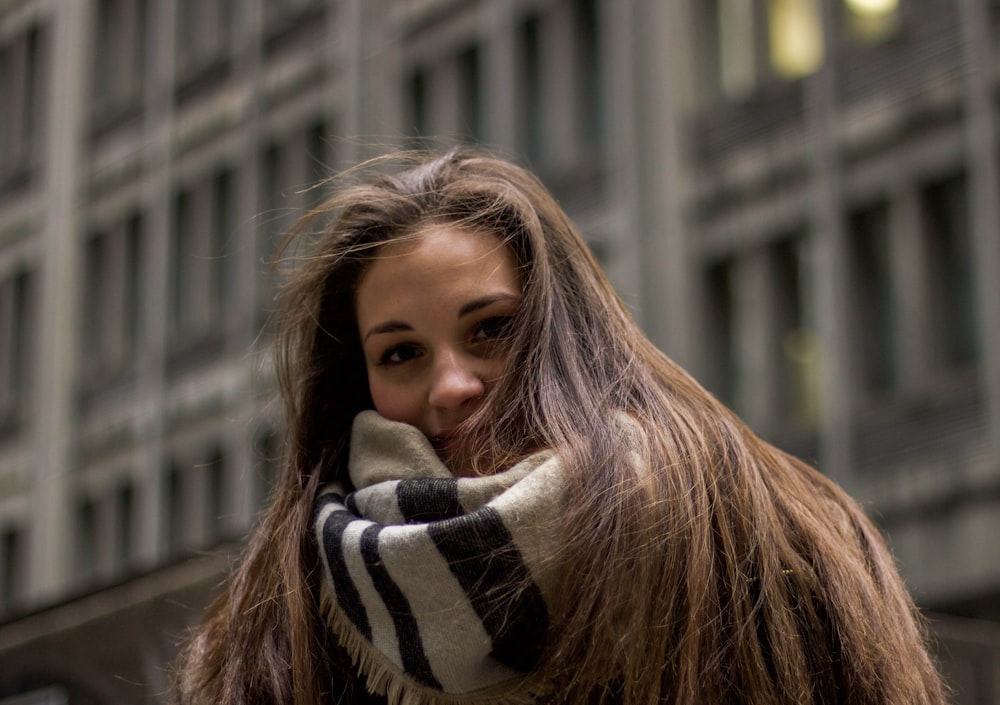 woman wearing black and white scarf