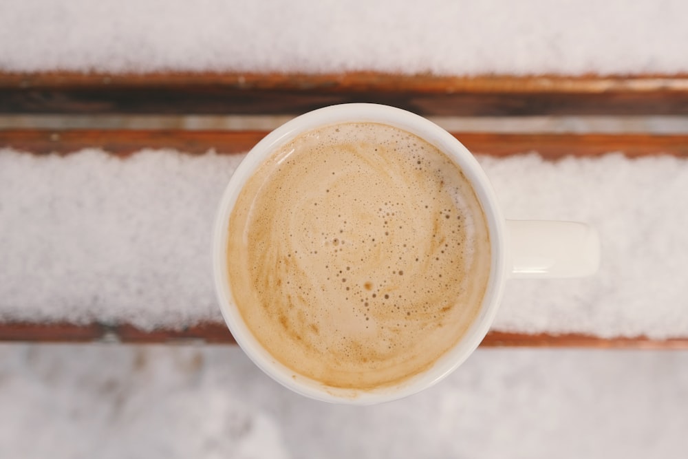 cup of cream frothed coffee