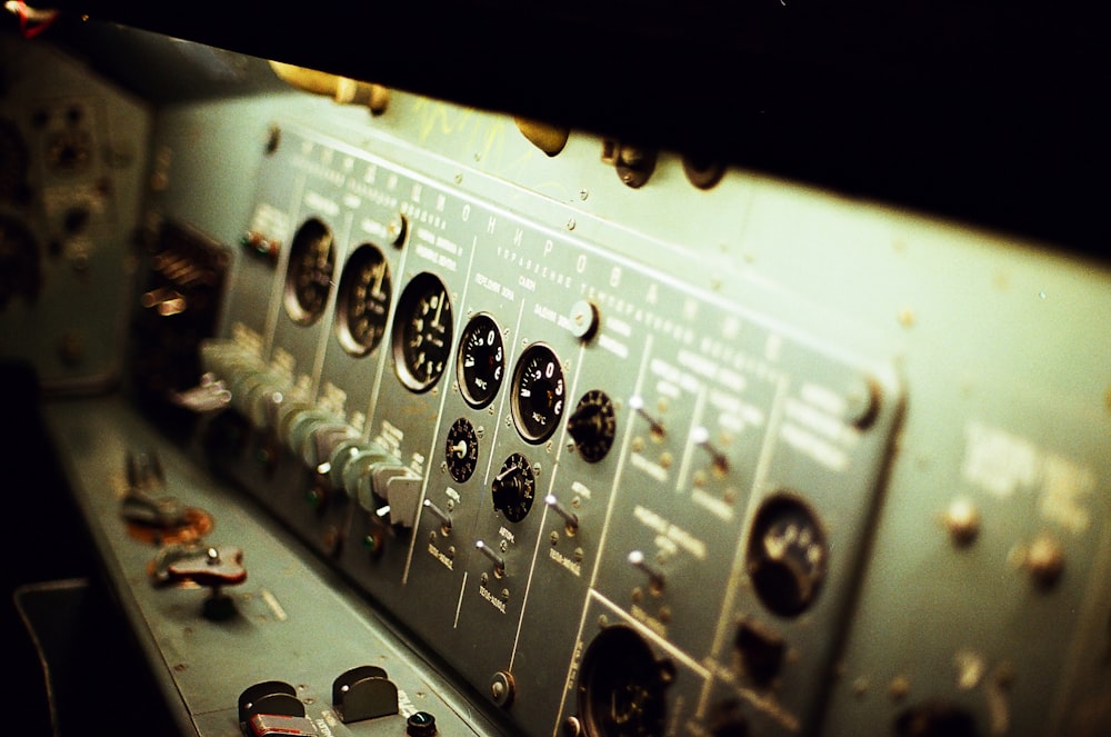 selective focus photography of grey electronic control panel