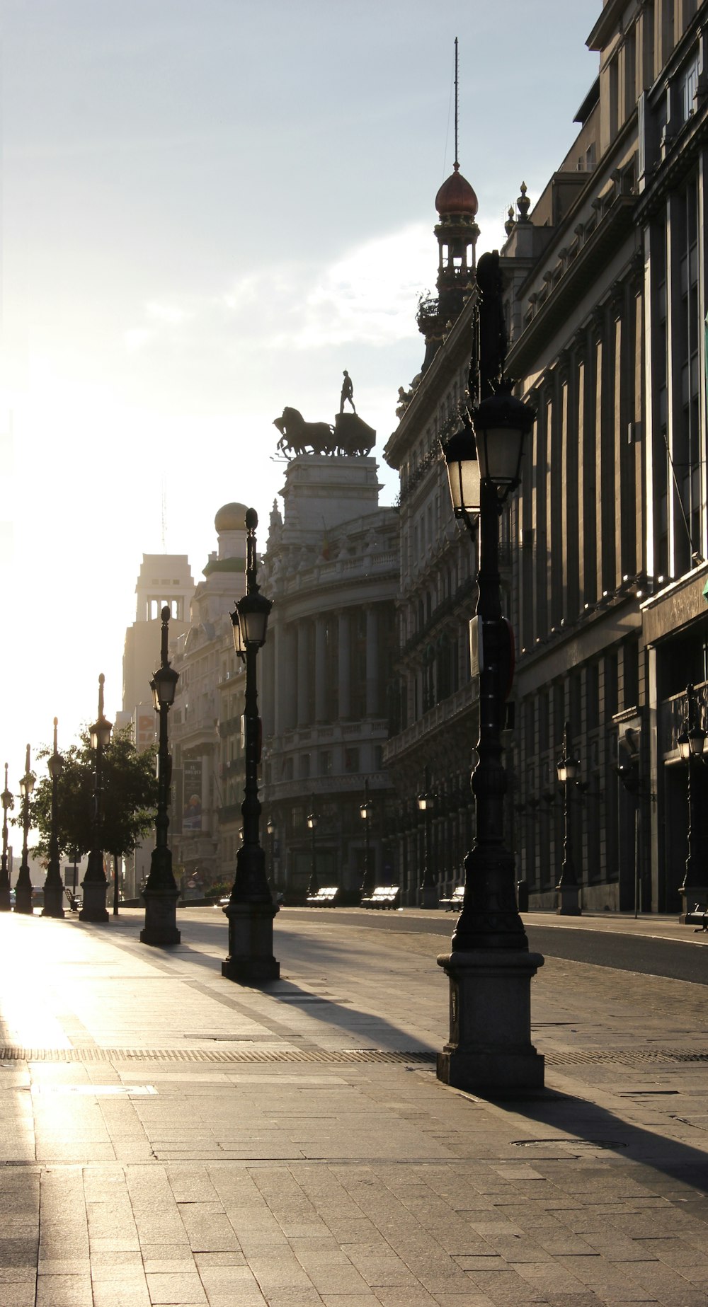 Light poles running down the side of the street.