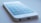 A close-up of a smartphone displaying a voice assistant interface.