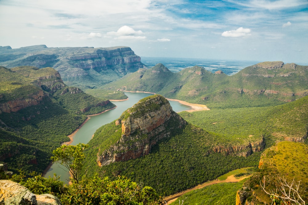 landscape photography of mountains under blue sky