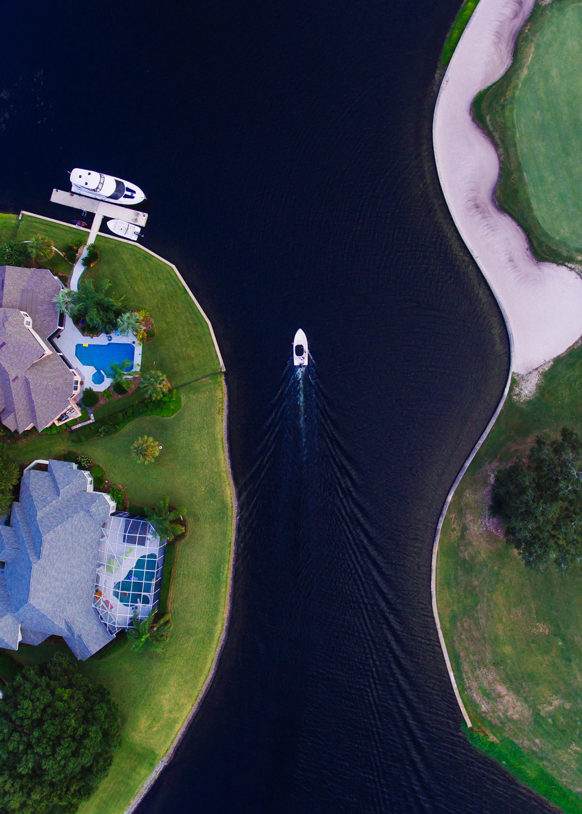 Aerial drone view of a waterfront property in the Arlington neighborhood of Jacksonville, Florida
