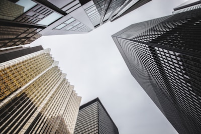 low-angle photography of high-rise buildings