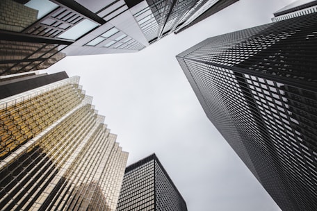 low-angle photography of high-rise buildings