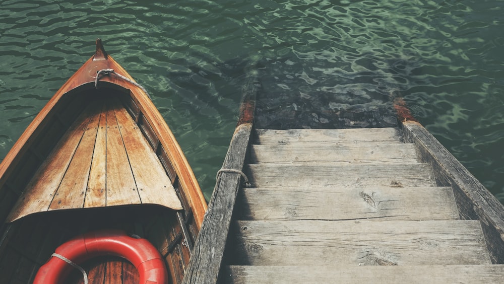 boat near wooden stairs