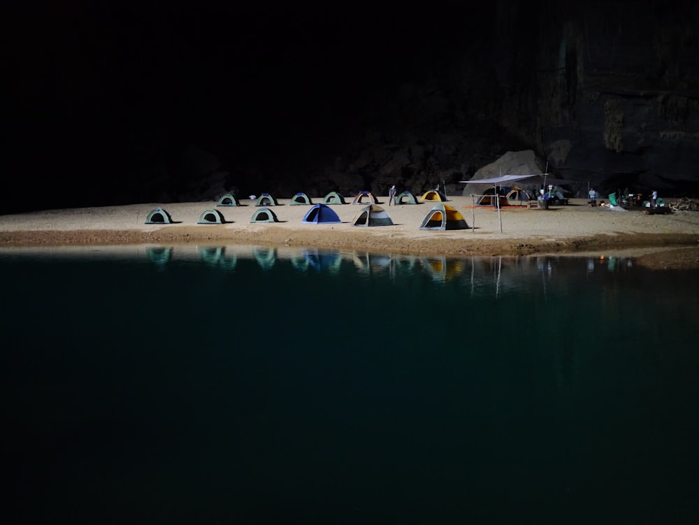 camping tents on brown sand beach