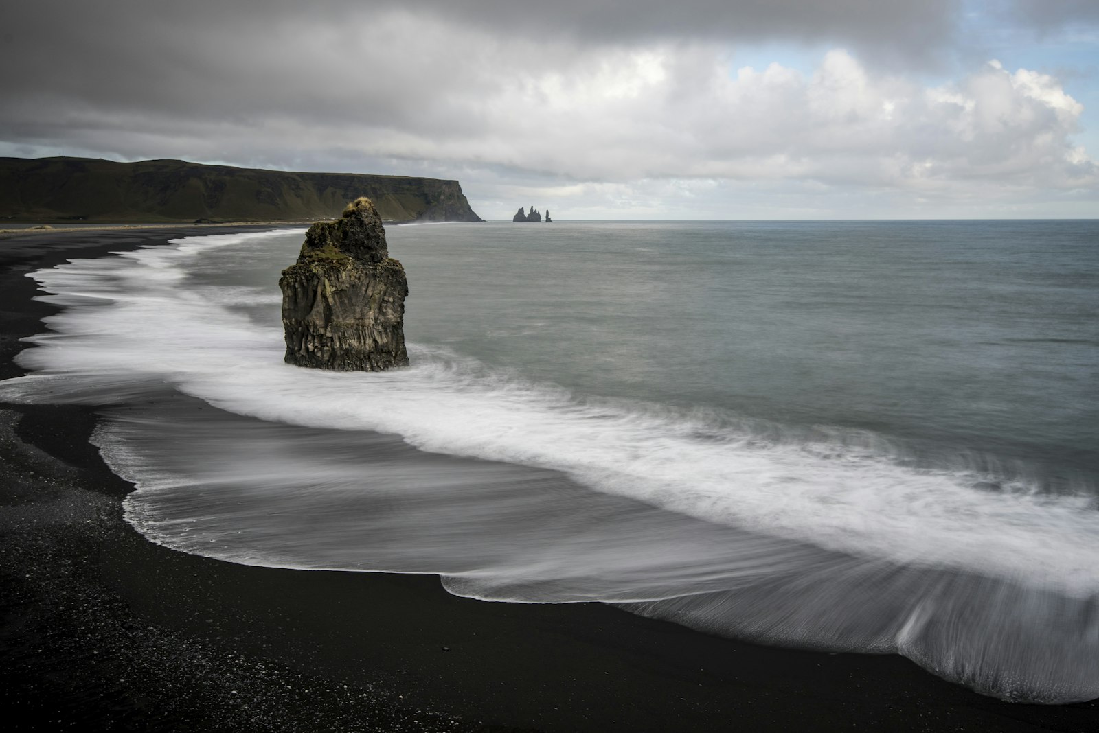 Nikon AF-S Nikkor 16-35mm F4G ED VR sample photo. Brown rock on seashore photography