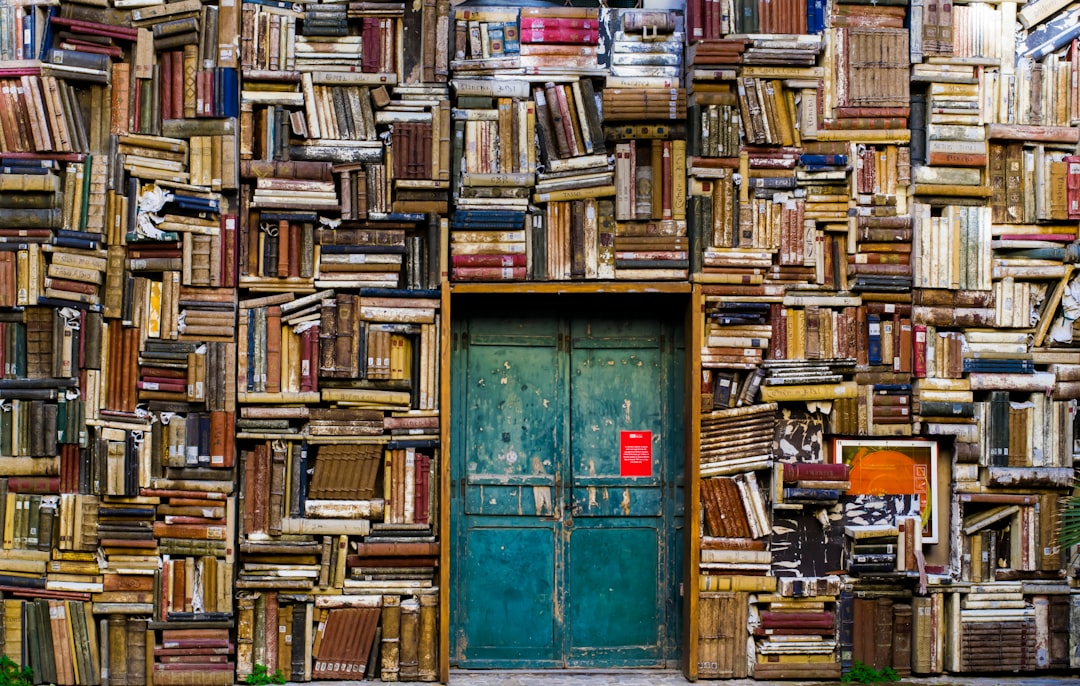 Wall of books with door of digital marketing terminology - digital marketing guide - Photo by Eugenio Mazzone | best digital marketing - London, Bristol and Bath marketing agency