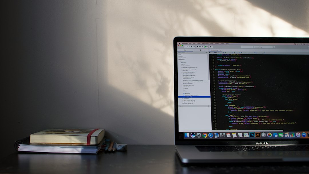 Laptop screen full of source code, the working environment Claude Code assumes you already live in