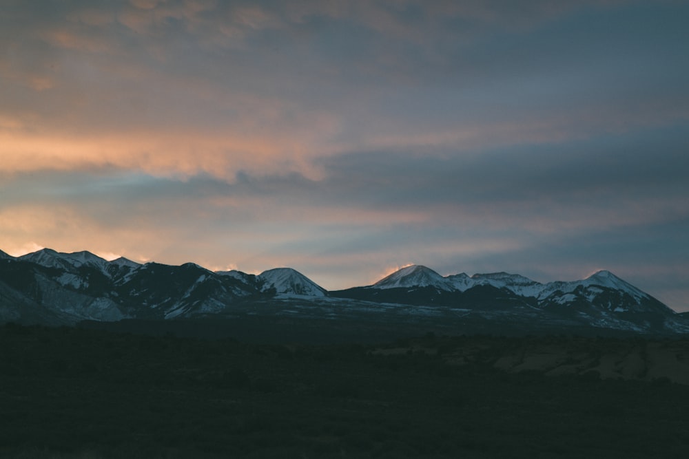 aerial photography of mountain at sunset