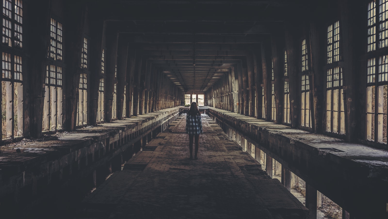 Fujifilm X-T10 + Fujifilm XF 27mm F2.8 sample photo. Person standing inside building photography