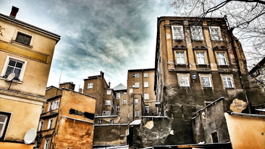 photography of brown concrete high-rise buildings in Klodzko Poland