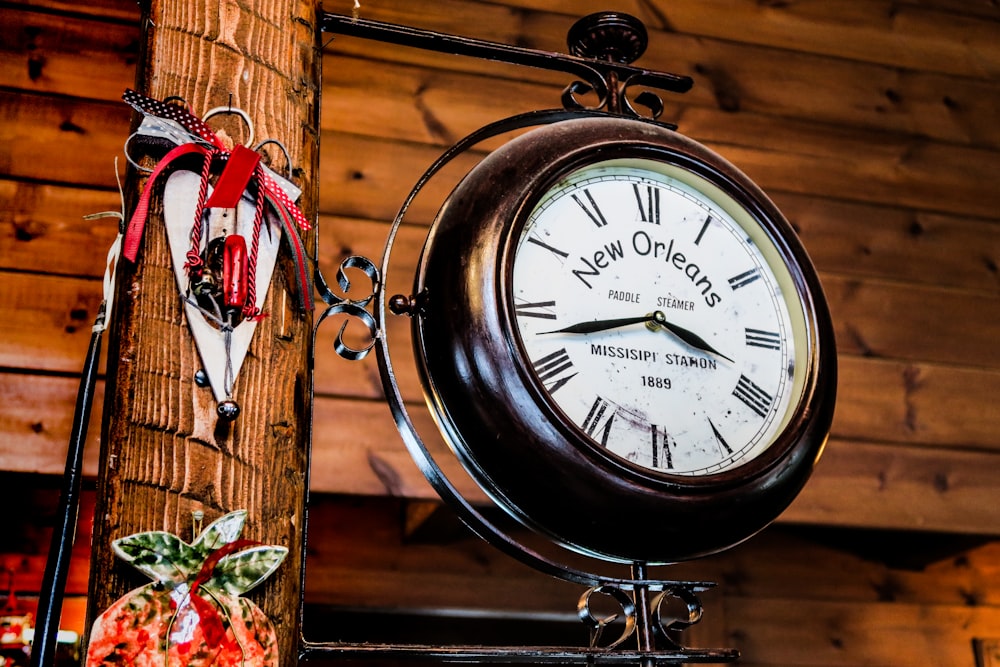 black New Orleans framed analog clock