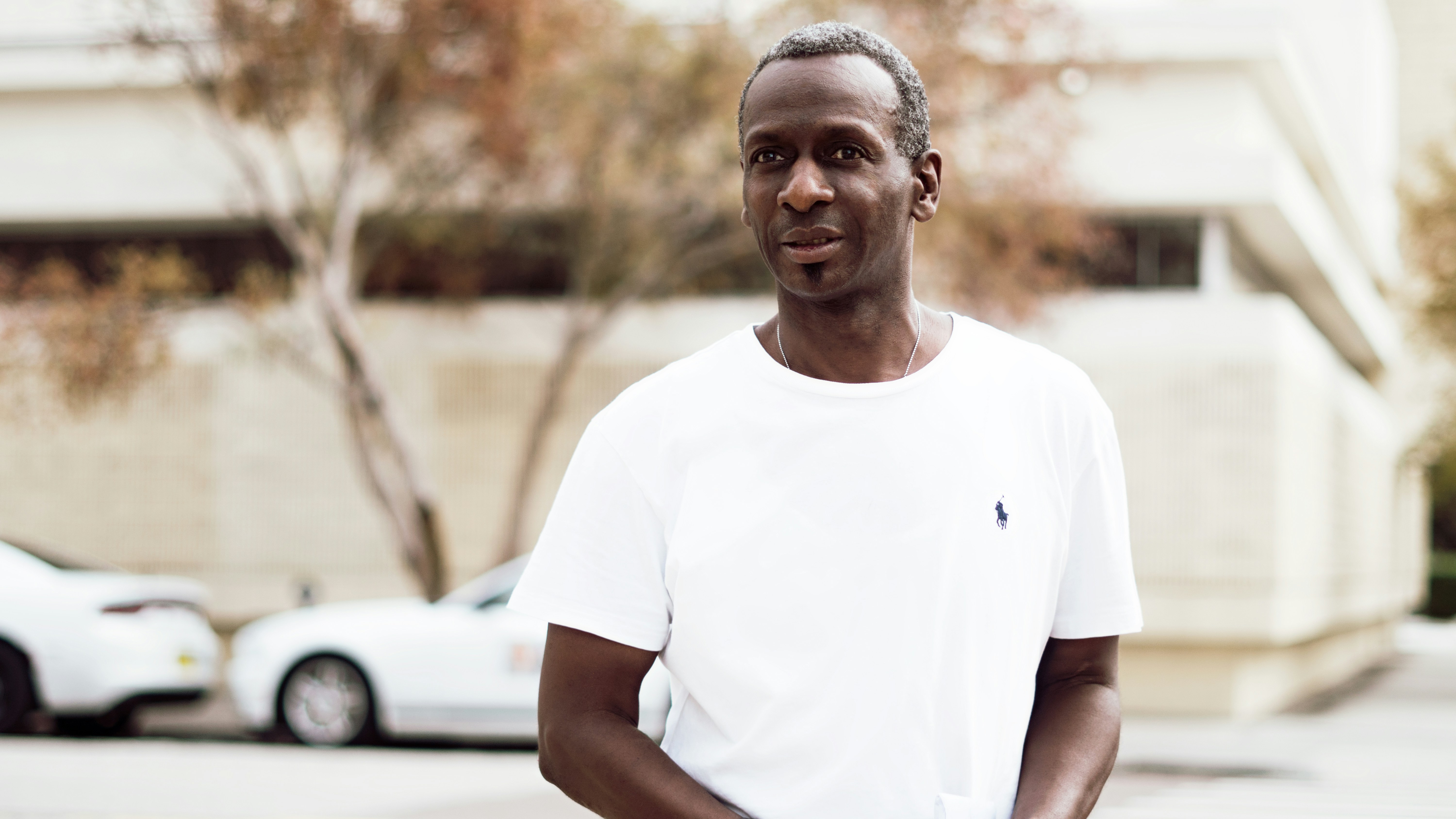 man standing on street