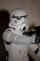 Detailed close-up of a Star Wars stormtrooper figure standing on a white background.