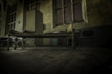 hospital bed on concrete pavement