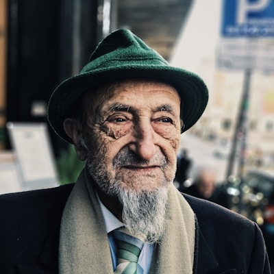 man wearing green hat during daytime
