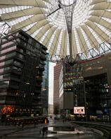 Close-up of advanced urban technology installations in a modern city square.
