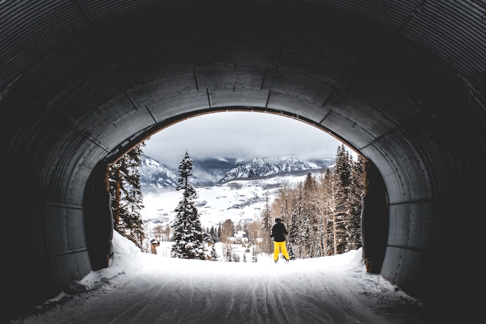 person outside tunnel