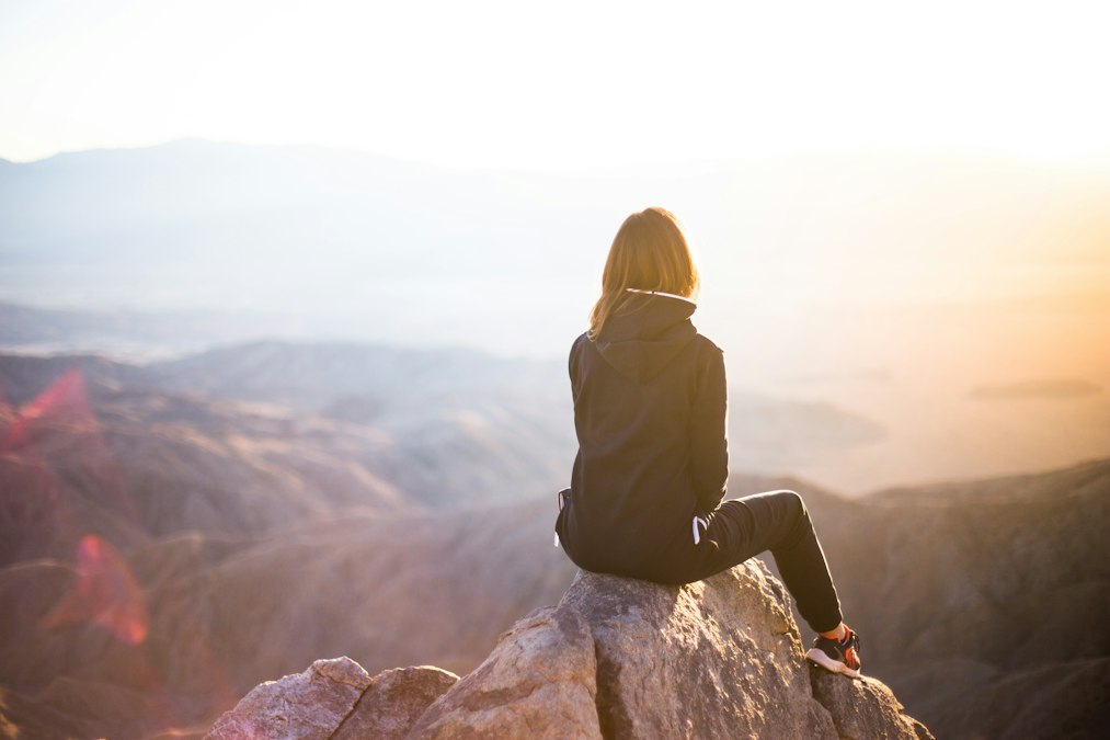 Woman reflecting on how natural lubrication changes with age during perimenopause