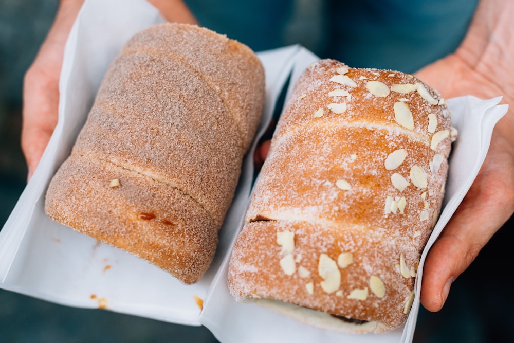 photography of two brown breads