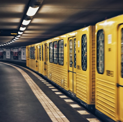 focus photo of yellow train