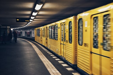 focus photo of yellow train
