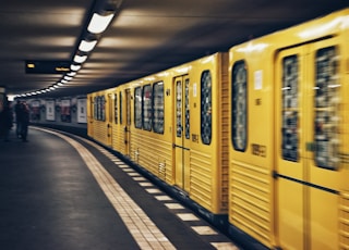 focus photo of yellow train