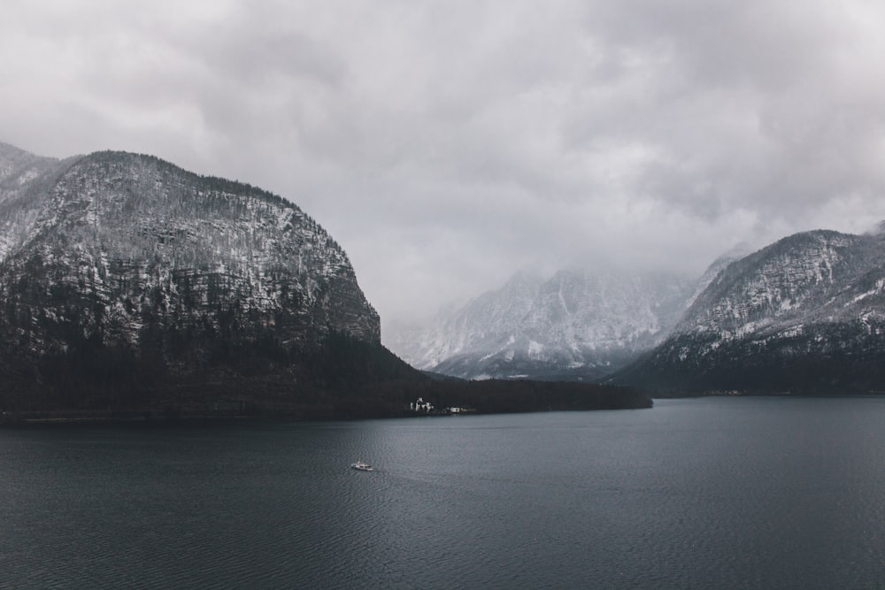 mountain surrounded by body of water