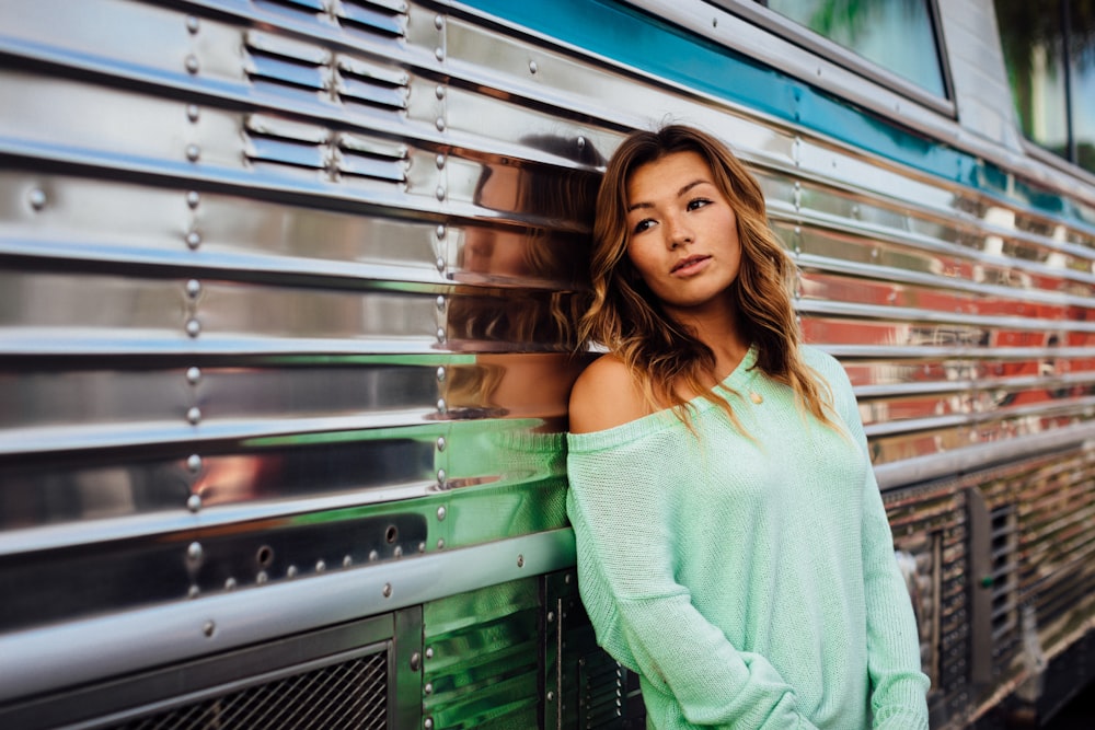 woman leaning on bus