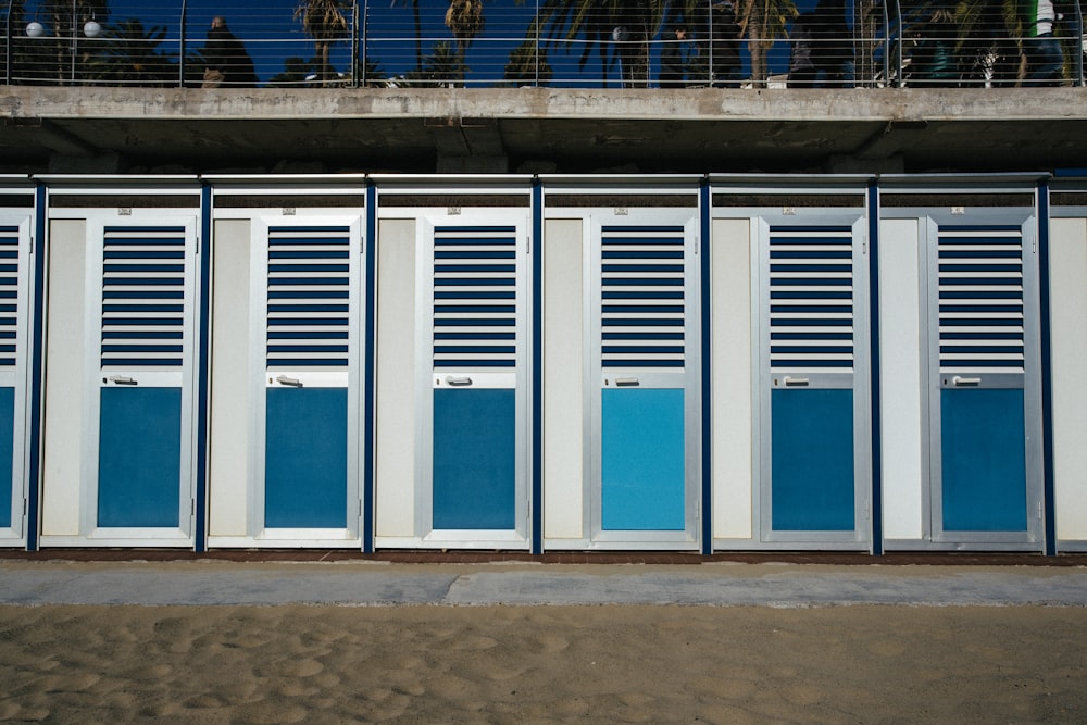 closed silver-and-teal doors