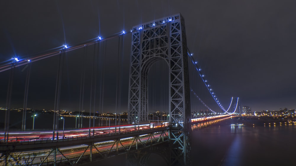 lighted suspension bridge wallpaper