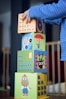 Image of a child playing with toy blocks