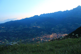 A panoramic view of a southern Brazilian town at sunset, highlighting local culture.