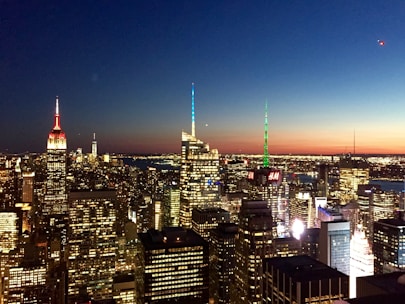 A city skyline at dusk symbolizing international business connections and expansion.